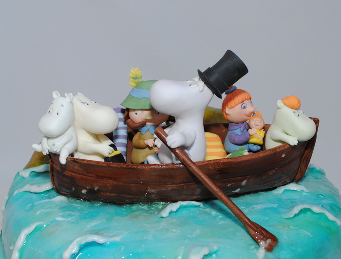 Муми-Тролли в лодке