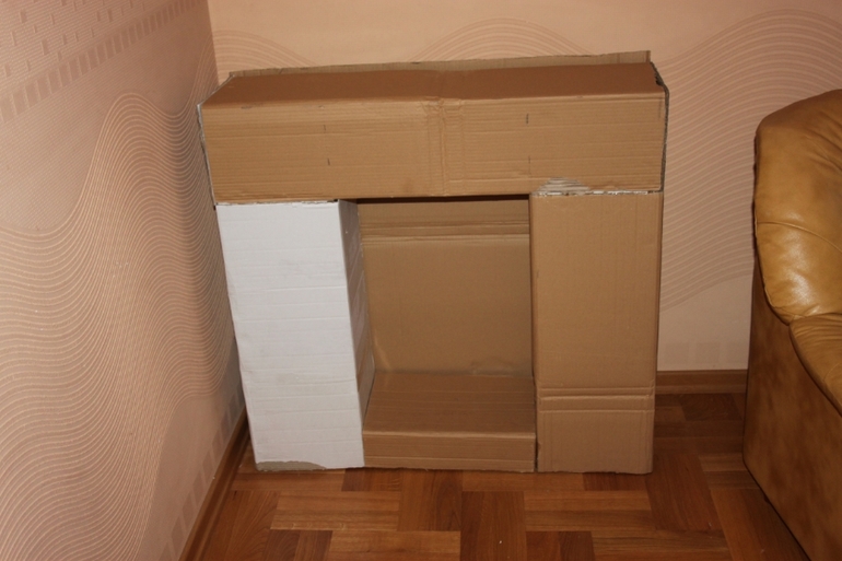 Согреться без огня: как сделать домашний камин из картонных коробок