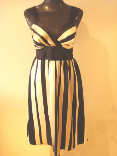 Платье фирмы STAR BY JULIEN MACDONALD.