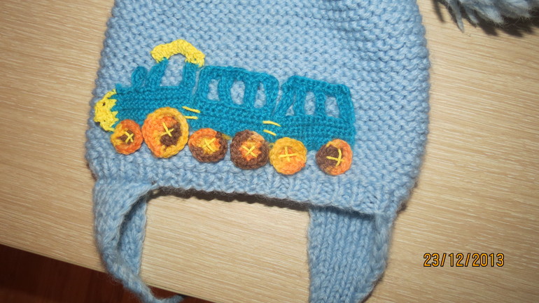 Шапочку омальчишила))))