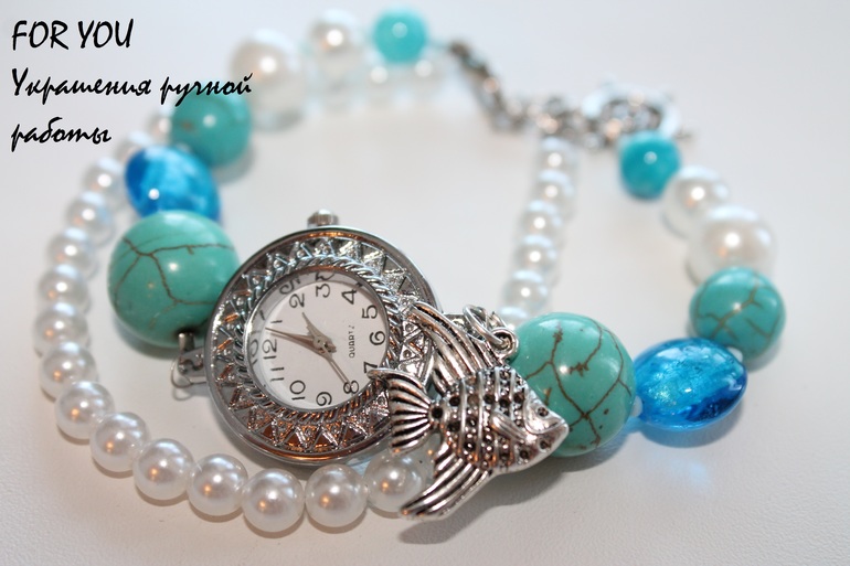 Часы с рыбкой