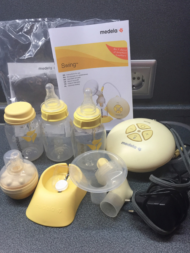 Молокоотсос Medela swing