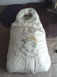 Продам конверт на овчине молочного цвета