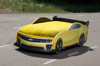 Кроватки-машинки с реалистичным дизайном