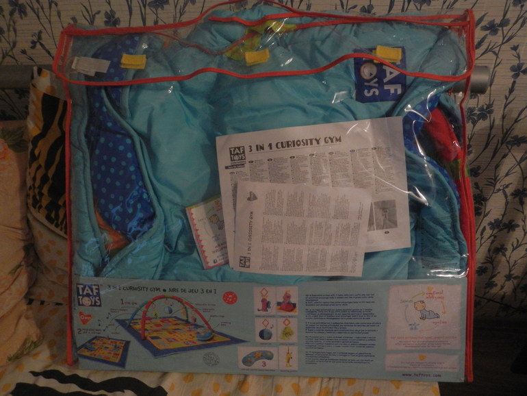 Развивающий коврик Taf Toys и Ходунки в подарок