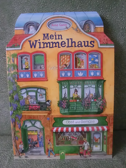И снова виммельбухи или дом с окошками от Анны Сьюз