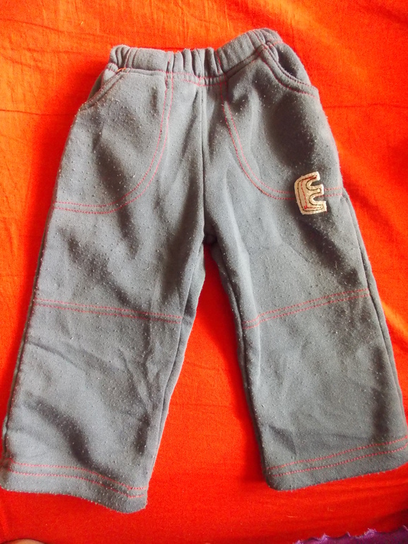 Много разной одежды для мальчика.