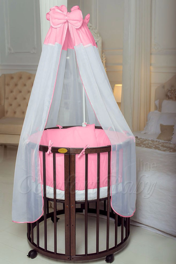КРОВАТКА- ТРАНСФОРМЕР "COMFORT BABY" .Цена: 25 000 руб.  ХАРАКТЕРИСТИКИ:  возраст детей: 0-5 лет  габариты модели (Д х Ш х В): 1) колыбельки: 78*76*81 см  2) овальной кроватки: 128*76*81 cм  матрас приобретается отдельно.  максимальная нагрузка: 120 кг  Материал: изготавливается только из настоящего массива бука высшего сорта.  сборка: кровать в разобранном виде, простота сборки, инструкция по сборке на русском языке  продукция сертифицирована  производство: Россия  гарантия: 2 года   Дополнительные характеристики: 4 положения по высоте (расстояние положения дна от пола без колес: 1см, 12см, 37см, 57см; расстояние между отверстиями снизу-наверх: 12см, 15см, 20см.); 3 прутика - съемные.  КОНМПЛЕКТАЦИЯ:  1-я ступень - круглая кроватка  2-я ступень - овальная кроватка  3-я ступень - диванчик  4-я ступень - манеж  5-я и 6-я ступени - 2 кресла и столик  7-я ступень - пеленальный столик  ДОПОЛНИТЕЛЬНЫЕ ОПЦИИ:  Комплект постельный "Classic" +6950 руб.  Комплект постельный "Colorit" + 11990 руб.  Фирменный держатель для балдахина +790 руб.  Комплект цельных матрасов " Холкон"/ "Кокос" (круглый+овальный) +8490 руб  Маятник "ComfortBaby Pendulum" 2 в 1+6990 руб.