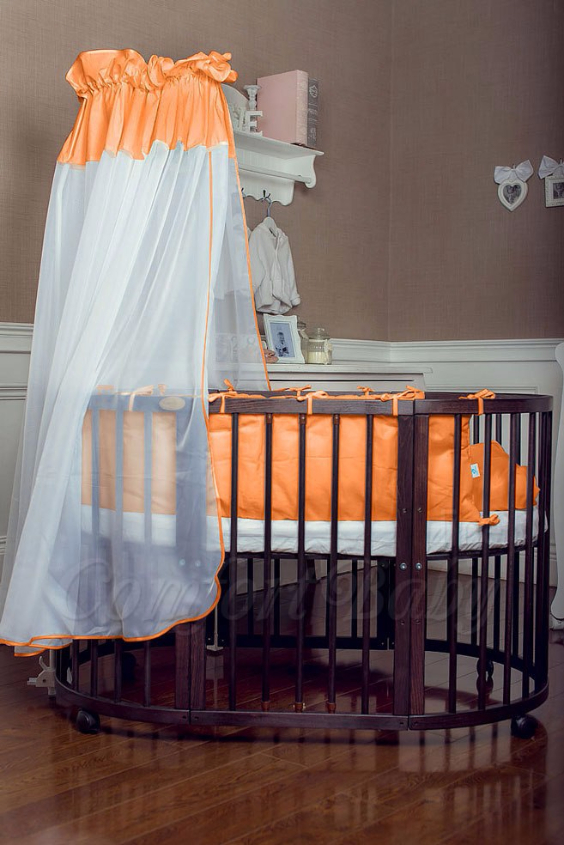 КРОВАТКА- ТРАНСФОРМЕР "COMFORT BABY" .Цена: 25 000 руб.  ХАРАКТЕРИСТИКИ:  возраст детей: 0-5 лет  габариты модели (Д х Ш х В): 1) колыбельки: 78*76*81 см  2) овальной кроватки: 128*76*81 cм  матрас приобретается отдельно.  максимальная нагрузка: 120 кг  Материал: изготавливается только из настоящего массива бука высшего сорта.  сборка: кровать в разобранном виде, простота сборки, инструкция по сборке на русском языке  продукция сертифицирована  производство: Россия  гарантия: 2 года   Дополнительные характеристики: 4 положения по высоте (расстояние положения дна от пола без колес: 1см, 12см, 37см, 57см; расстояние между отверстиями снизу-наверх: 12см, 15см, 20см.); 3 прутика - съемные.  КОНМПЛЕКТАЦИЯ:  1-я ступень - круглая кроватка  2-я ступень - овальная кроватка  3-я ступень - диванчик  4-я ступень - манеж  5-я и 6-я ступени - 2 кресла и столик  7-я ступень - пеленальный столик  ДОПОЛНИТЕЛЬНЫЕ ОПЦИИ:  Комплект постельный "Classic" +6950 руб.  Комплект постельный "Colorit" + 11990 руб.  Фирменный держатель для балдахина +790 руб.  Комплект цельных матрасов " Холкон"/ "Кокос" (круглый+овальный) +8490 руб  Маятник "ComfortBaby Pendulum" 2 в 1+6990 руб.