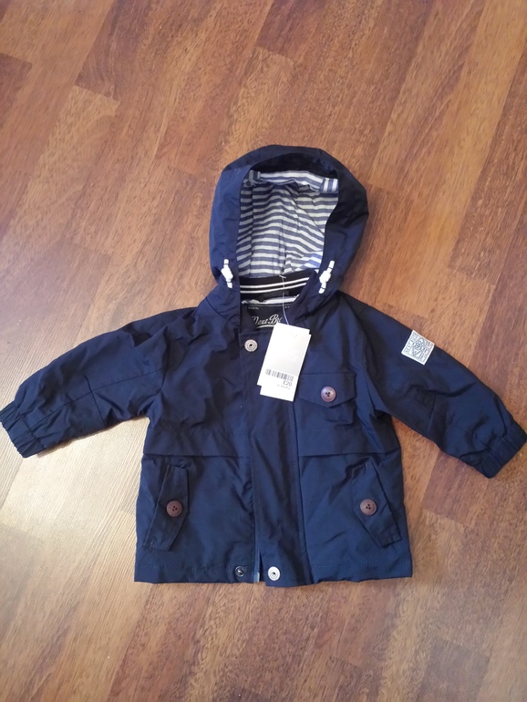 Продам новую ветровку Next