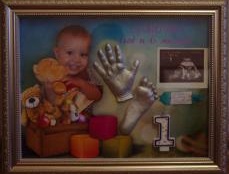 Слепки детских ручек и ножек в раме